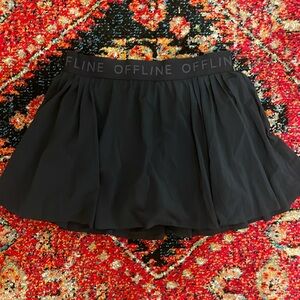 Pleaded off-line black tennis skirt